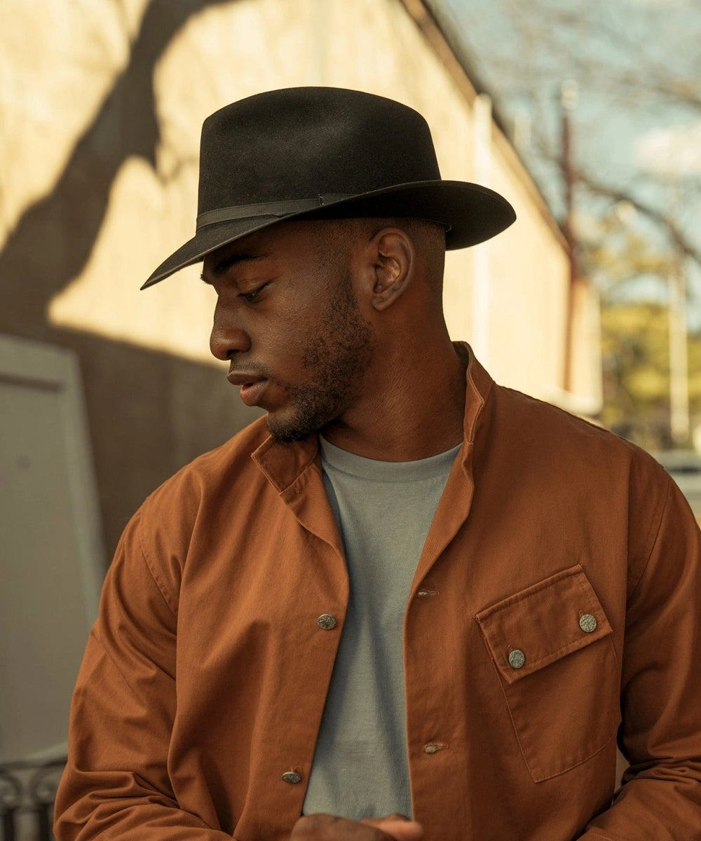"teardrop crown hat with leather sweatband"