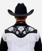 Back view of a male model showing the wide brim Magnate black hat