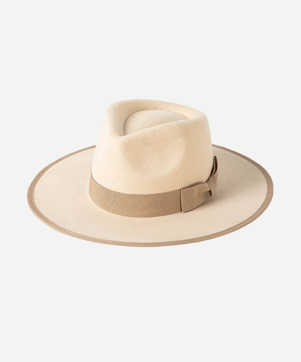 Beige Legacy fedora with defined crown, as seen on female model styling