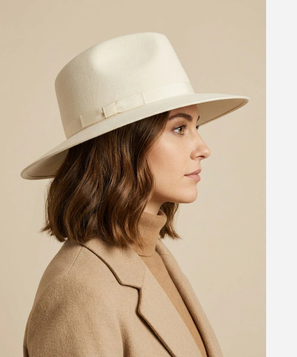 Cinematic wide brim hat styled with  white turtleneck for modern mid-century noir