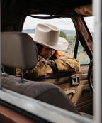 Close up of female model in casual shirt wearing Latitude natural cream felt cowboy hat LBORA