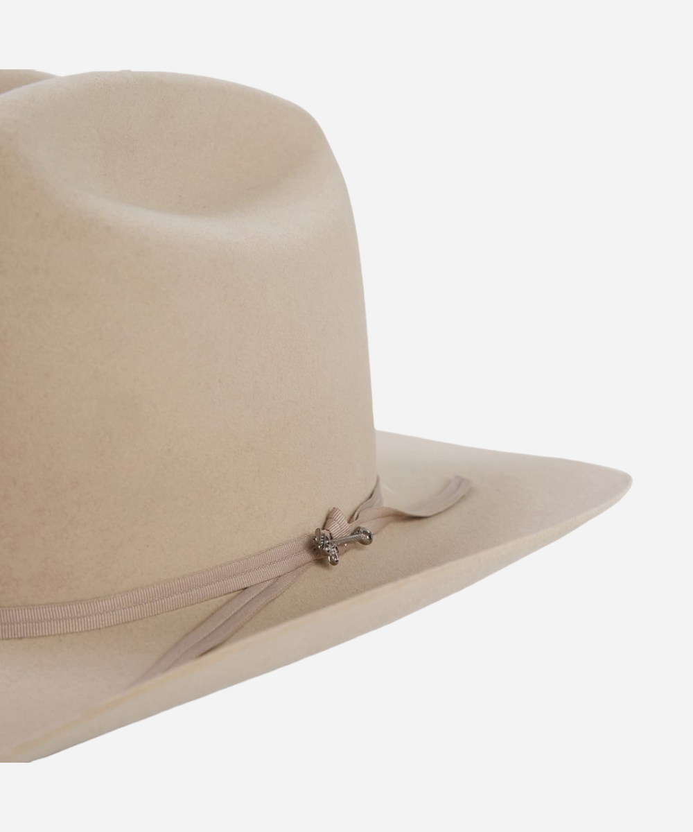 Close up of luxury Latitude natural felt texture and minimalist accent feather hat band