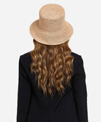 Minimalist Solstice women's summer sun hat crafted from breathable natural straw fibers for travel comfort USA