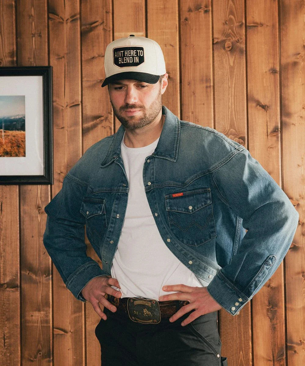 Outlaw country lifestyle apparel collection paired with a charcoal black visor Outlier cap