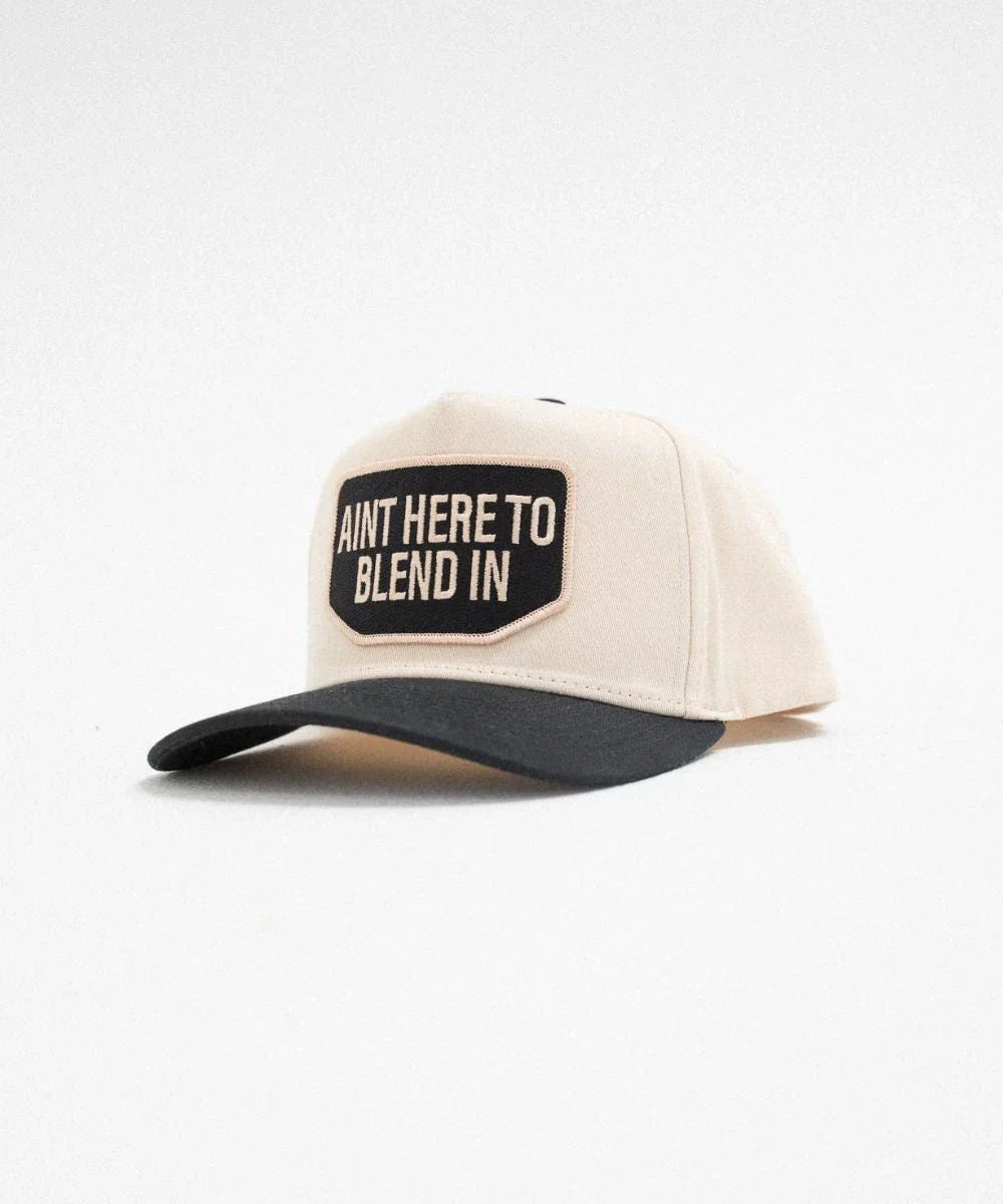 Outlier canvas trucker hat in vintage beige and black street style UK