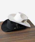 Premium Frontier black wool felt western hat showing its durable wide brim line and slim leather band