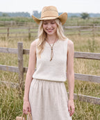 Off-duty street fashion accessory trends featuring a soft oatmeal cowboy straw hat