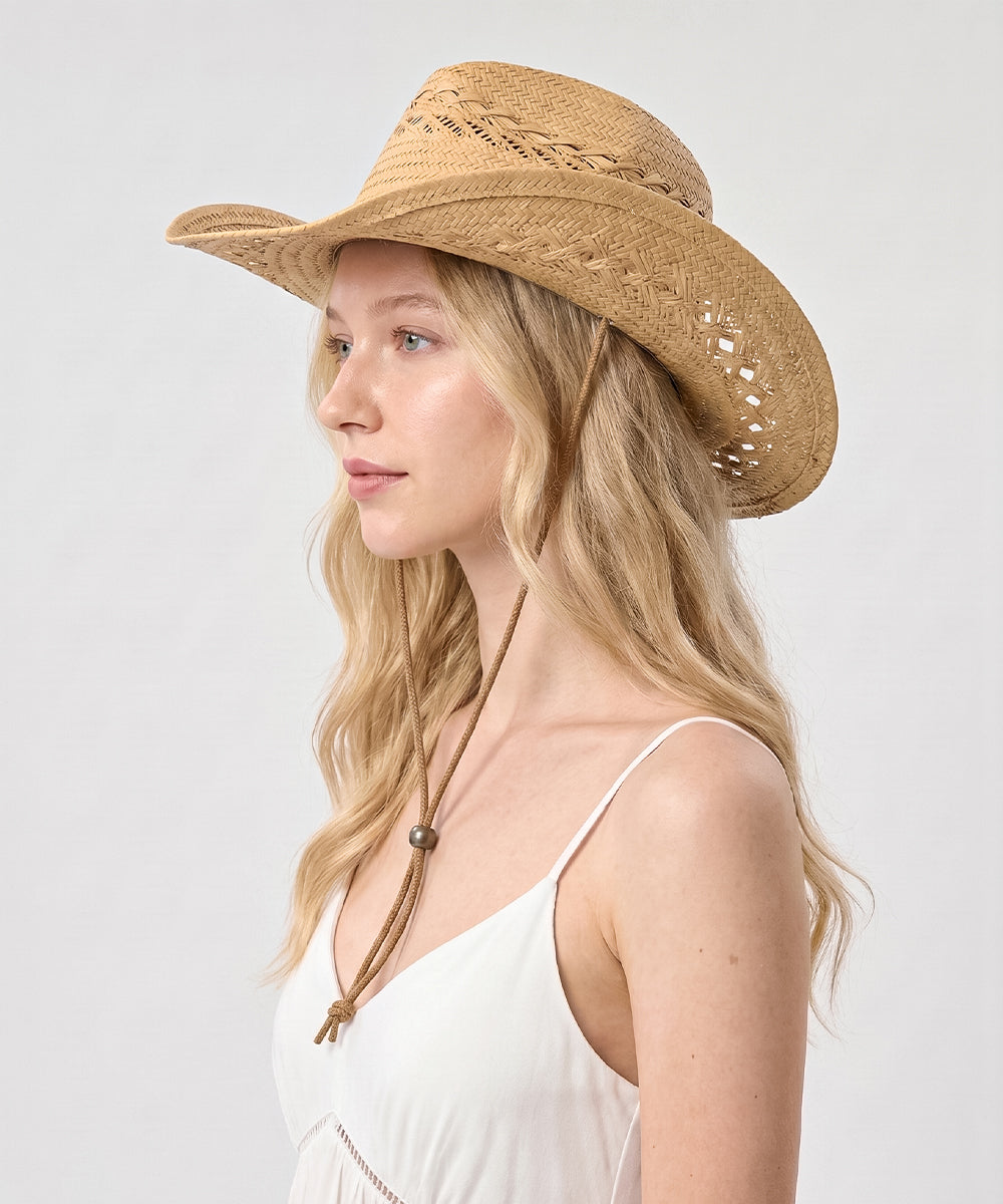 Quiet luxury outdoor clothing collection accessorized by an oatmeal tan beach hat